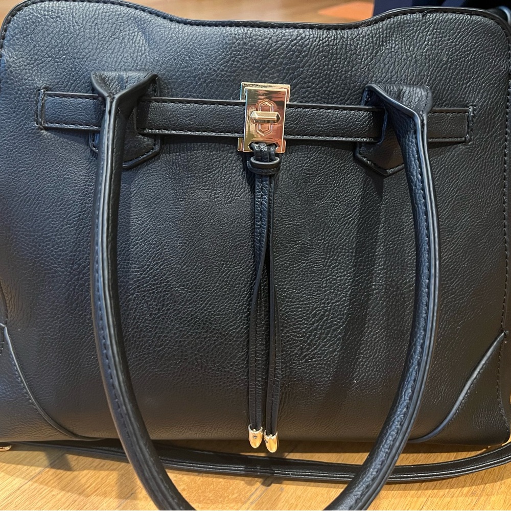 Black leather tote - very durable and spacious !
